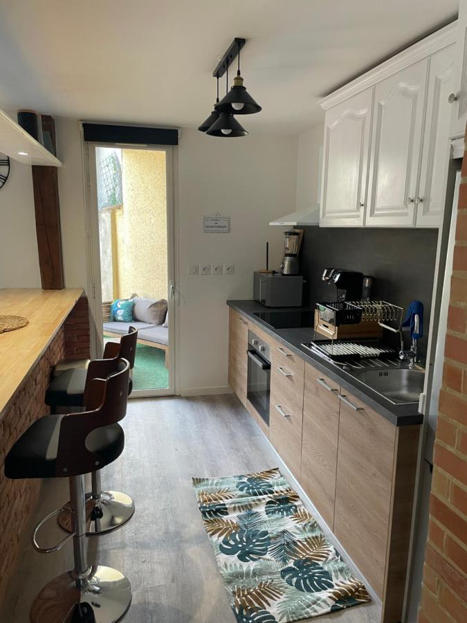 Appartement en rez de jardin tout équipé Fleurance Extérieur photo